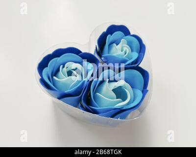 Blue flowers made from luxury soap as a romantic gift isolated on the white background Stock Photo