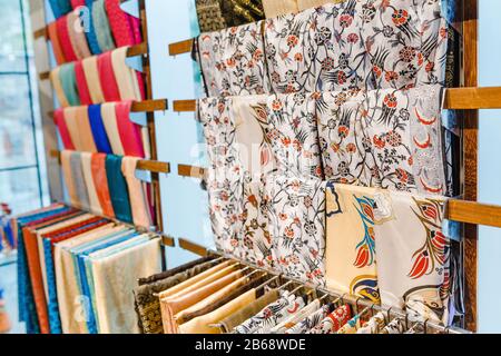 Traditional scarfs for sale on a market in Middle East, Asia Stock Photo