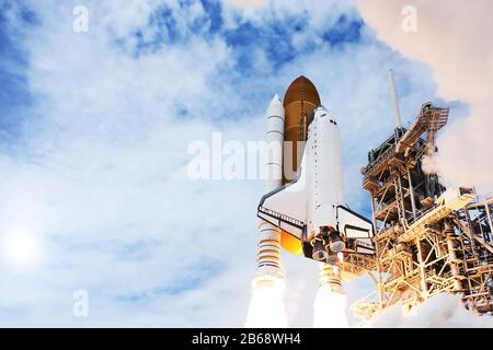 The launch of the rocket with the shuttle. Against the sky. Elements of this image were furnished by NASA. Stock Photo