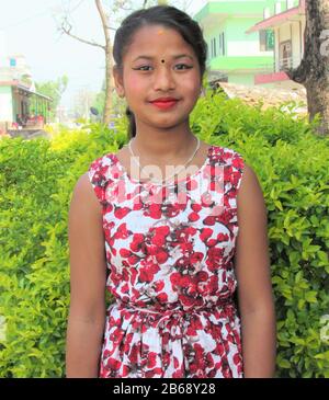 Stylish Young Nepalese Girl in Morden dress looking at camera, Western Terai, Tilottama Municipality, Bihuli, Rupandehi Nepal. Stock Photo