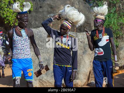 Larim tribe men dancing during a wedding ceremony, Boya Mountains, Imatong, South Sudan Stock Photo