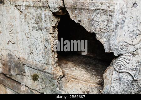 Olympos is an ancient greek town on a mediterranean shore, large historical, archaeological and tourist attraction in Turkey, Chirali Stock Photo