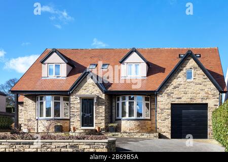 Beautiful english bungalow with red roof Stock Photo