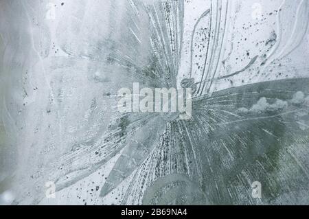 Detail of engraved glass window by Sir Laurence Whistler. Delicate etched lines depict a butterfly. St Nicholas Church, Moreton, Dorset, England, UK. Stock Photo