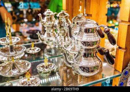 Silver Arab kettles for tea for sale on Oriental bazaar Stock Photo