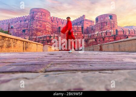 Agra Fort and an Indian woman silhouette Stock Photo