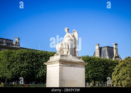 History statue near the Triumphal Arch of the Carrousel in Paris, France Stock Photo