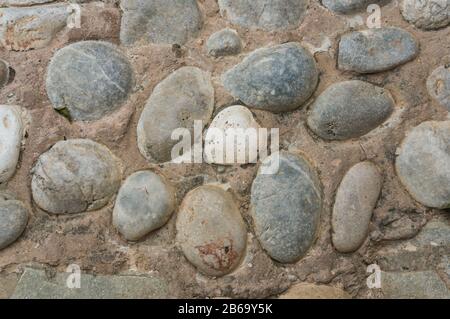 The texture of the stone pavement. Cobblestone pavement Stock Photo
