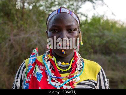 Portrait of a Larim tribe woman with traditional eaerrings and nose earrings, Boya Mountains, Imatong, South Sudan Stock Photo