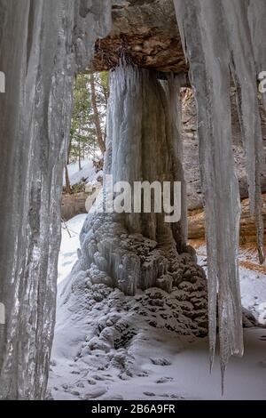 Memorial Falls is a waterfall in Munising Michigan and is frozen solid in winter season Stock Photo