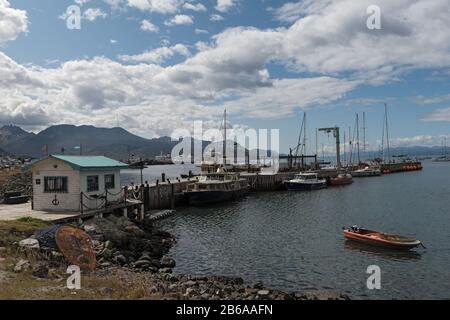 view of the ships and boats in Ushuaia Harbor, Argentina Stock Photo