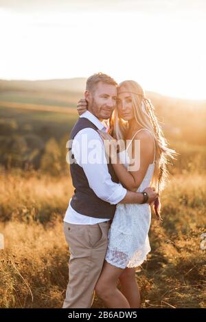 Indie Style Smiling Couple, Woman Embracing Man, Hipster Outfit, Boho Chic  Stock Image - Image of girlfriend, lifestyle: 144883743