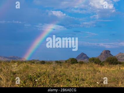 Rainbow over the countryside, Namorunyang State, Kapoeta, South Sudan Stock Photo
