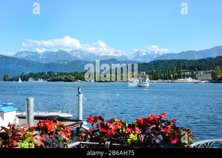 - JULY 3, 2014: Pleasure boats on the Lake. Located in central Switzerland it is the fourth largest lake in the country. Stock Photo