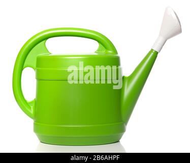 Green plastic watering can on a white background Stock Photo