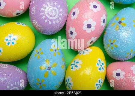 Painted Easter eggs on a colorful background Stock Photo