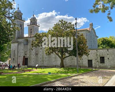 Basilica del Santisimo Saramento; Catholic church, old stone building, religious, exterior, 1808, by Portugese, twin bell towers, park, Barrio Histori Stock Photo