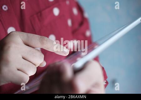 Business women hand use digital tablet with copy space Stock Photo