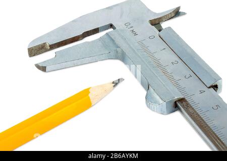 Pencil and vernier caliper close-up on a white background. Stock Photo