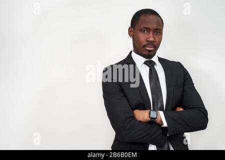 Successful confident african american businessman with folded arms with copy space Stock Photo