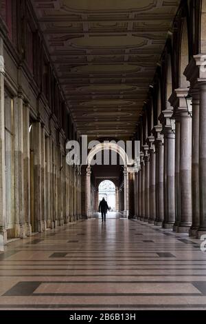 Turin, Italy. 10th Mar, 2020. TURIN, ITALY - March 10, 2020: A person walks in the deserted arcades. The Italian government puts the whole country on lockdown as Italy is battling the world's second-most deadly COVID-19 coronavirus outbreak after China. (Photo by Nicolò Campo/Sipa USA) Credit: Sipa USA/Alamy Live News Stock Photo