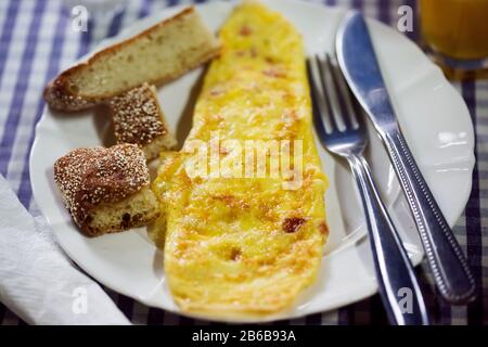 Egg omelette with fresh bread, Moroccan breakfast Stock Photo