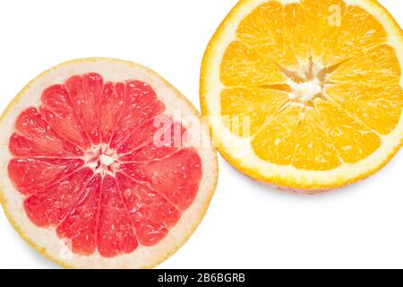 Slices of orange and red grapefruit isolated on white background. Stock Photo