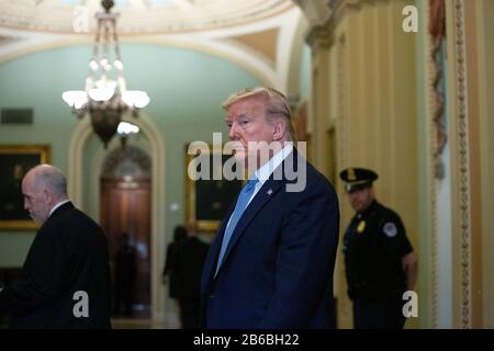 Washington, DC, USA. 10th Mar, 2020. United States President Donald J. Trump leaves after attending Republican Policy Luncheons at the United States Capitol in Washington, DC, U.S., on Tuesday, March 10, 2020. Credit: Stefani Reynolds/CNP | usage worldwide Credit: dpa/Alamy Live News Stock Photo