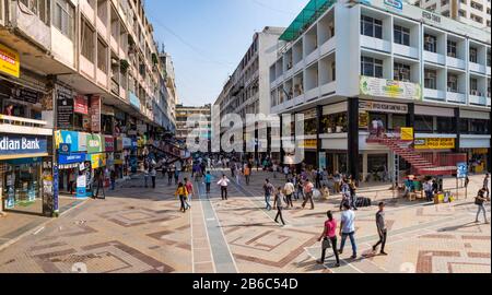 New Delhi, India - March 24, 2018: Large crowd on Nehru Place, taken in spring on a sunny late afternoon Stock Photo