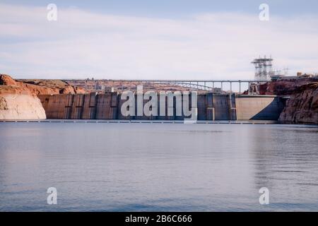 From the lake reservoir view of Glen Canyon Dam on Lake Powell and the Colorado River in Page Arizona Stock Photo