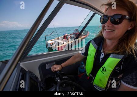 Port Nelson deputy harbourmaster Amanda Kerr on the waters off Port Nelson, Nelson, New Zealand Stock Photo