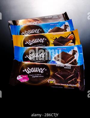 Wawel chocolate bar on dark background. Wawel is polish confectionery company, producing chocolates, wafers, snacks founded in 1898 in Krakow, Poland Stock Photo