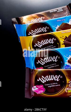 Wawel chocolate bar on dark background. Wawel is polish confectionery company, producing chocolates, wafers, snacks founded in 1898 in Krakow, Poland Stock Photo