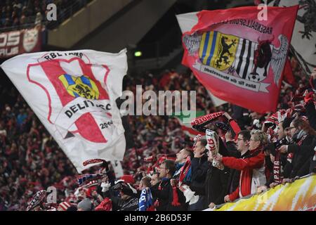 Leipzig, Germany. 10th Mar, 2020. Football: Champions League, knockout round, round of 16, second leg: RB Leipzig - Tottenham Hotspur in the Red Bull Arena. Leipzig's fans cheer on their team's 2-0 lead. Credit: Hendrik Schmidt/dpa-Zentralbild/dpa/Alamy Live News