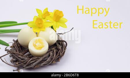 Easter eggs. Happy easter card. Easter eggs on a white wooden background. Easter background. Easter eggs. Easter card. Easter greetings. Happy easter. Stock Photo