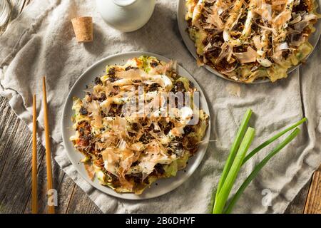 Homemade Japaense Okonomiyaki Cabbage Pancake with Mayo and Bonito Stock Photo