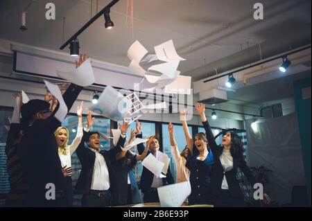 Large business team showing unity with their hands together Stock Photo