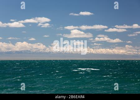 Lake in Mogolia in front of mountains Stock Photo