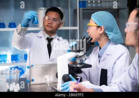 Scientific researchers team are working in the laboratory Stock Photo