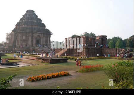 Tourists at a Hindu temple built in the shape of a chariot for the sun god Surya, Sun Temple, Konark, Orissa, India Stock Photo