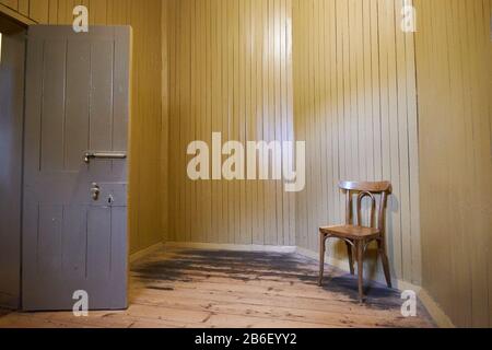 The male prisoner's holding area room at the old Courthouse, now a museum. In Beechworth, Victoria, Australia. Stock Photo