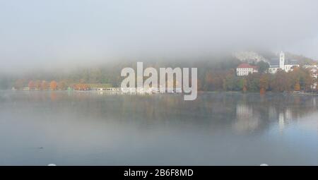 Lake Bled in a foggy autumn day, Slovenia, Julian Alps, Central Europe Stock Photo
