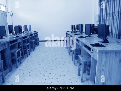 Computer Lab, Neatly placed rows of computers. Stock Photo