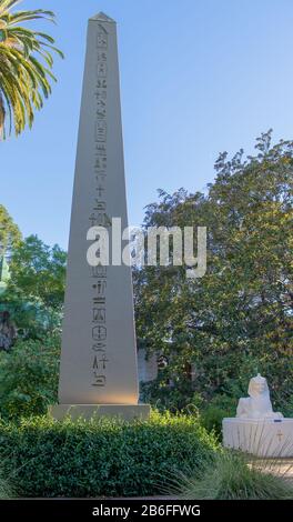 An obelisk and statue of a pharoah at the Rosicrucian Egyptian Museum in San Jose, California Stock Photo