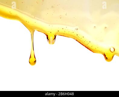 Flow and drop of honey. Stock Photo
