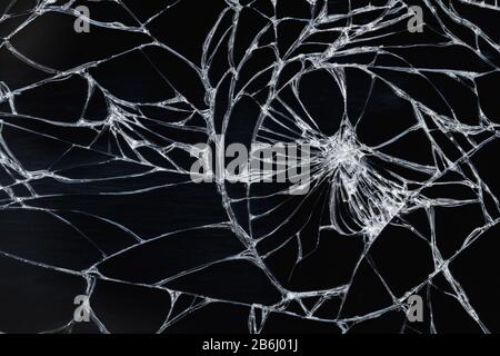 Broken display screen - white lines on black background, design element. Closeup, selective focus Stock Photo