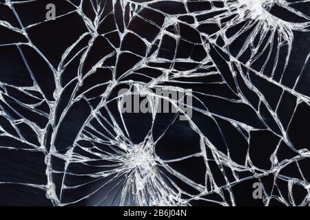 Broken display screen - white lines on black background, design element. Closeup, selective focus Stock Photo