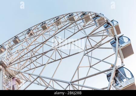 Modern Ferris Wheel detail Over Blue Sky Stock Photo