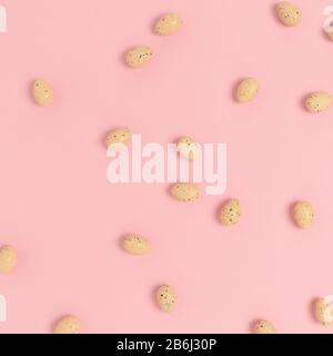 Pattern made of easter eggs on a pink pastel background. Holiday creative concept. Stock Photo