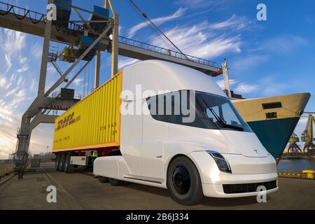 Vision of using Tesla Semi Truck electric truck by DHL logistics company Stock Photo